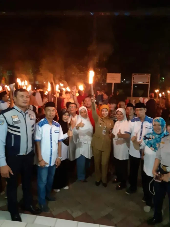 Sambut Idul Fitri 1439 Hijriyah, Camat Cipayung Ikut Meriahkan Pawai Obor Bersama Warga Lubang Buaya